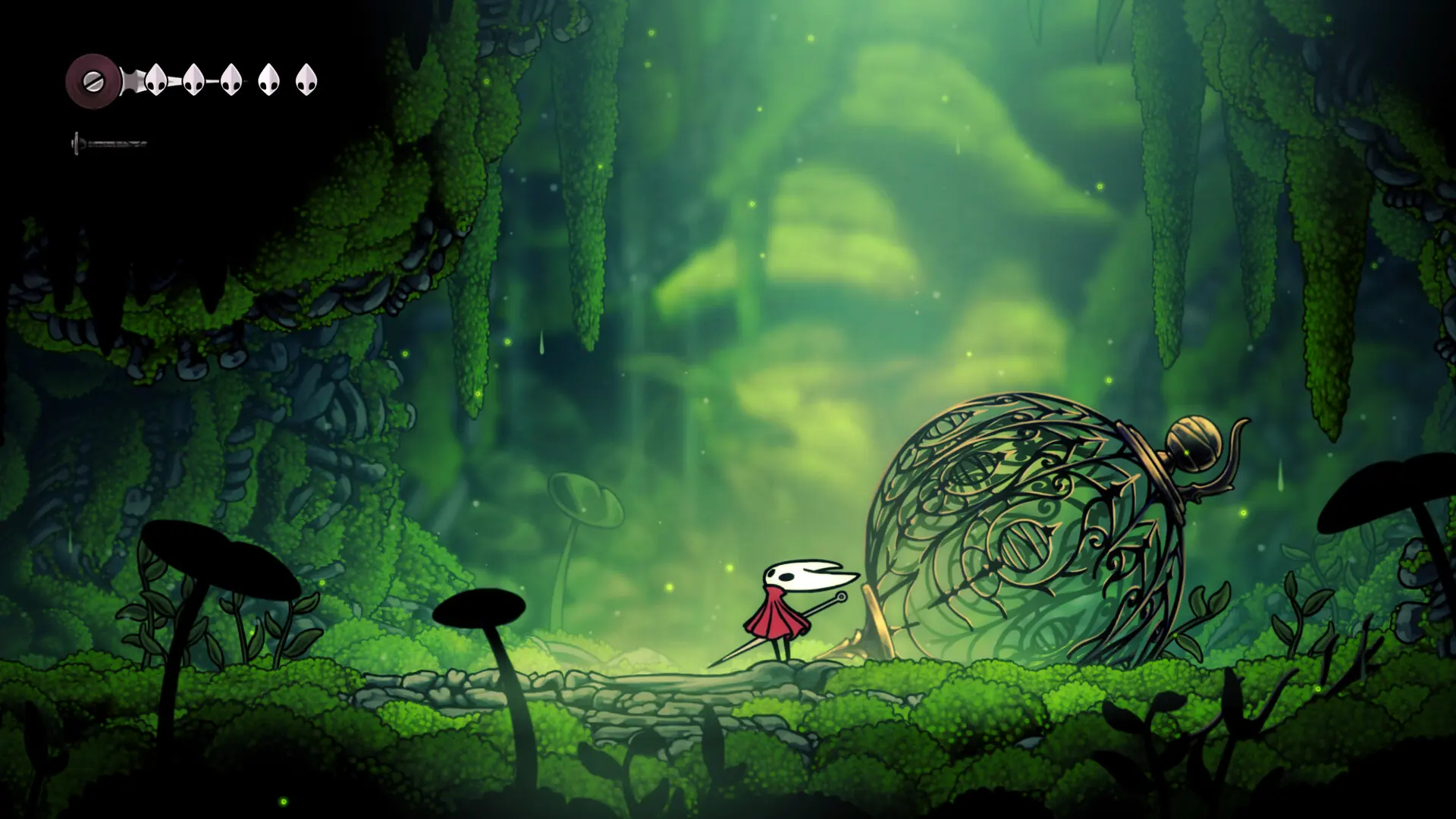Official Steam gameplay screenshot of Hornet beside an ornate shell in a green cavern